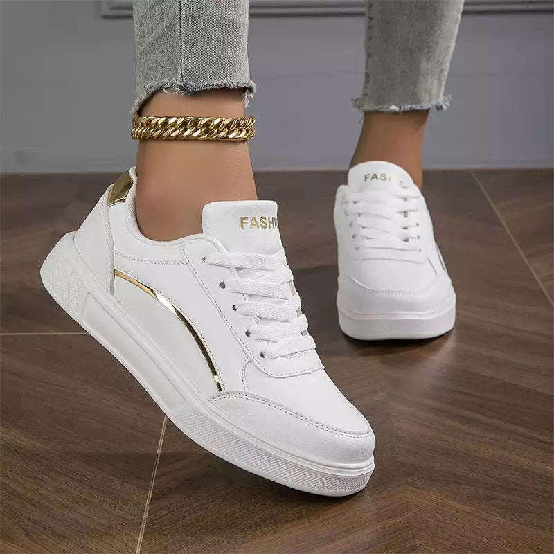 Zapatilla blanca elegante para mujer.