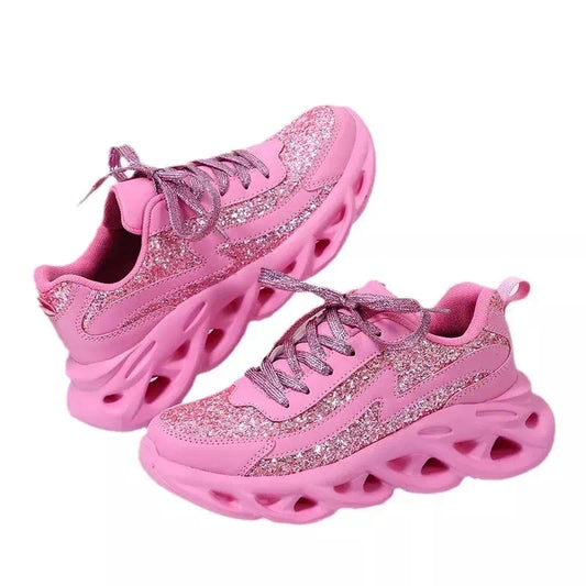 Zapatilla rosa para mujer.